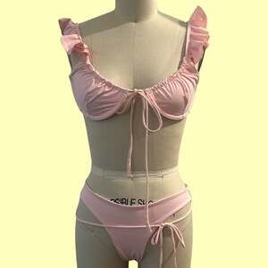 Frankies Bikinis Birdie Ruffle Top and Ali Skimpy Bottom Set in Love Pink
